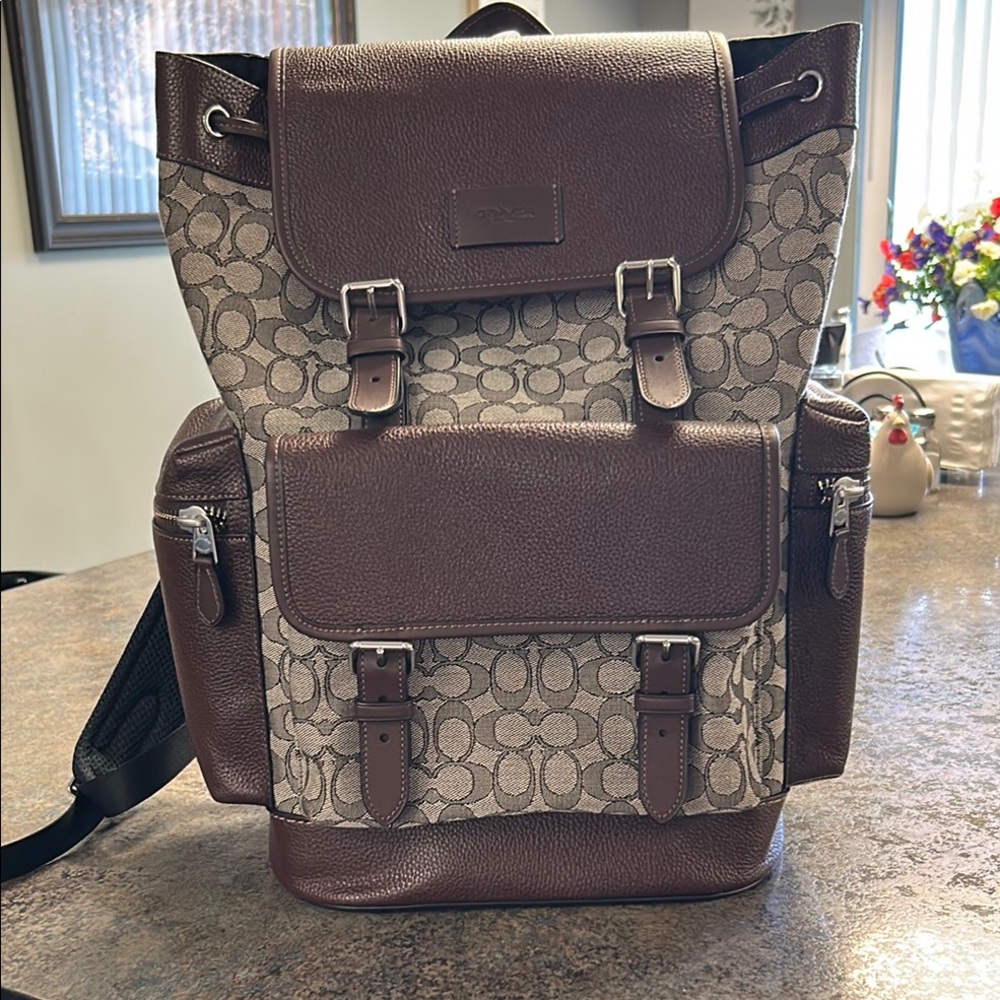 Coach Brown Signature Canvas & Leather Top-Load Backpack. 19” tall 15”wide